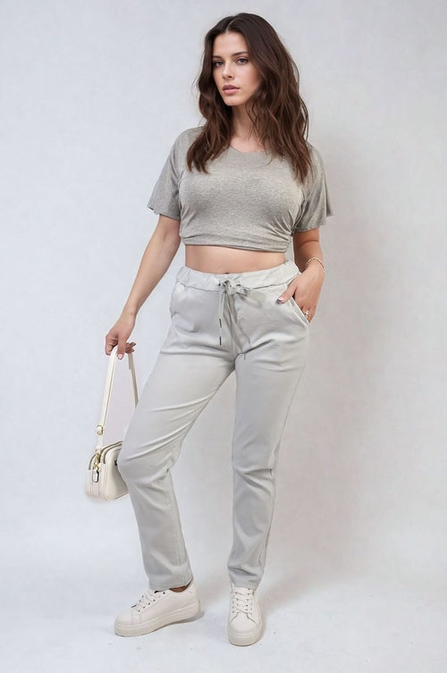 Light grey drawstring tapered trousers with side pockets