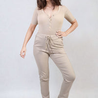 Drawstring tapered trousers in beige, side pockets, drawstring elastic waist