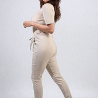 Drawstring tapered trousers in tan, side pockets, drawstring elastic waist