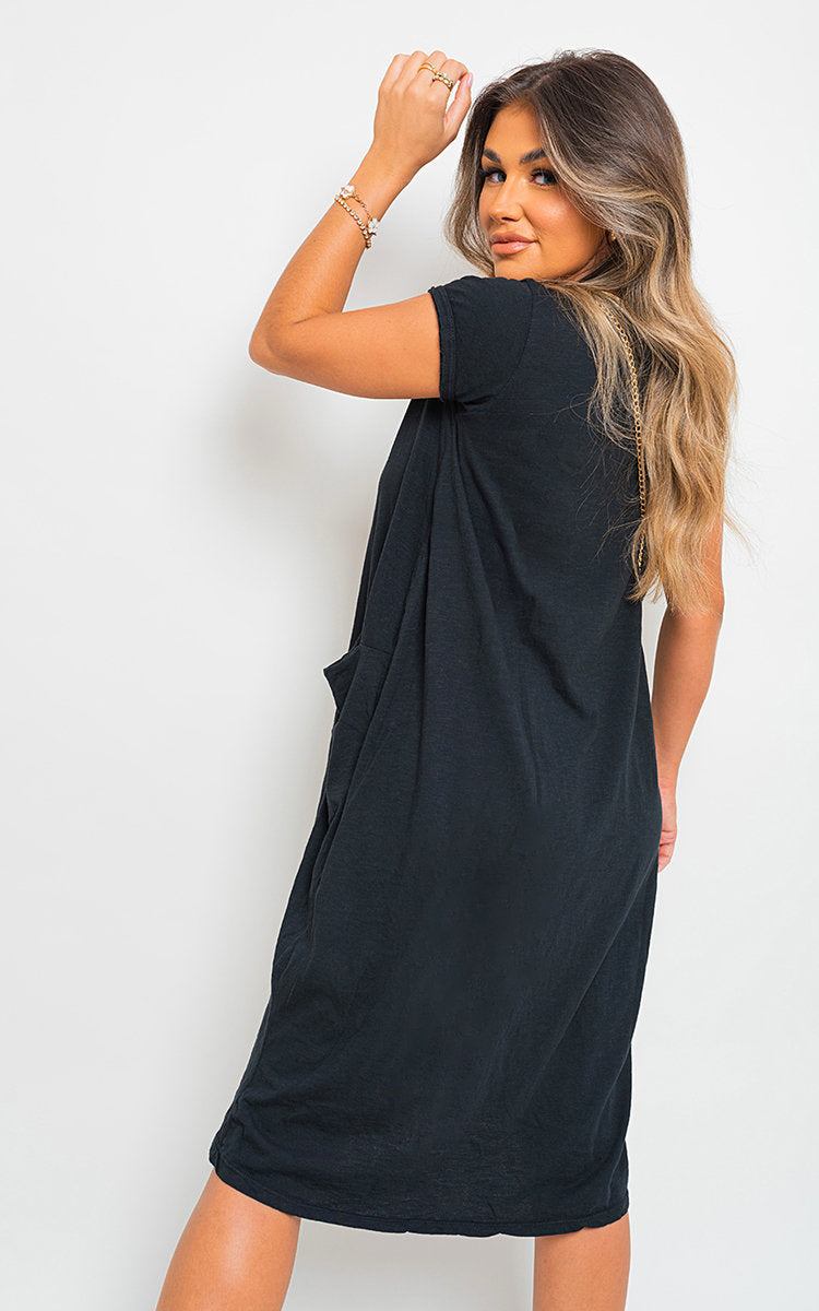 Black short-sleeve tunic top with relaxed fit and crew neckline