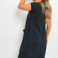Black short-sleeve tunic top with relaxed fit and crew neckline