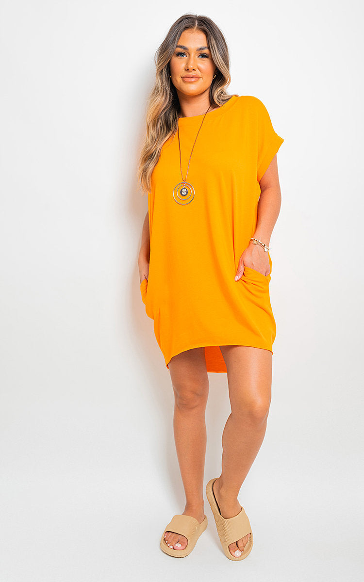 Short-sleeve top with front pockets, orange tunic length