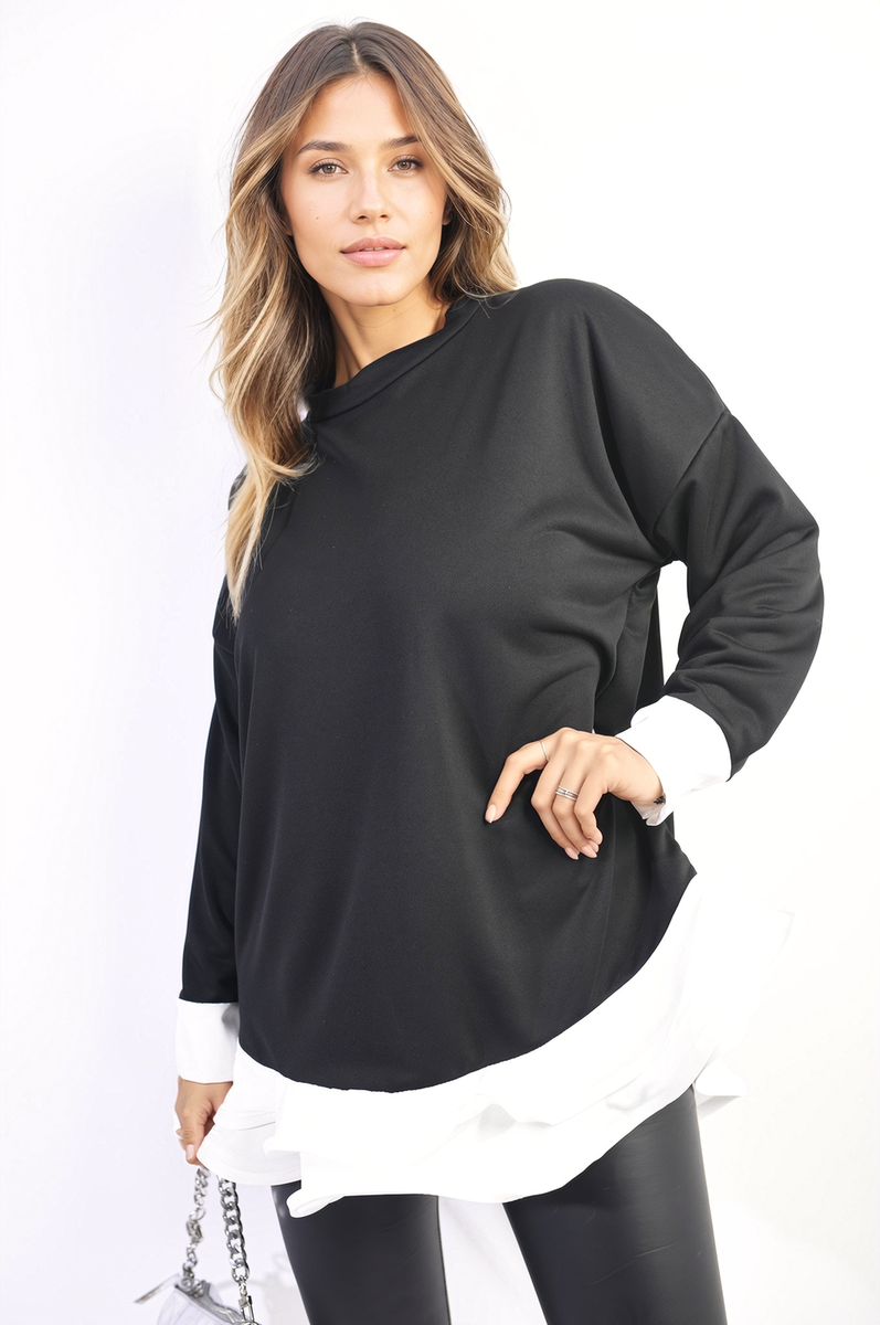 Black oversized dress top with long sleeves and white contrast ruffle hem