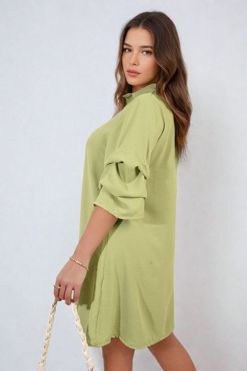 Light olive shirt dress with collar and loose sleeves, side view.