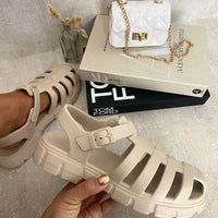 Beige chunky strappy sandals with round open toe and wide cutout straps