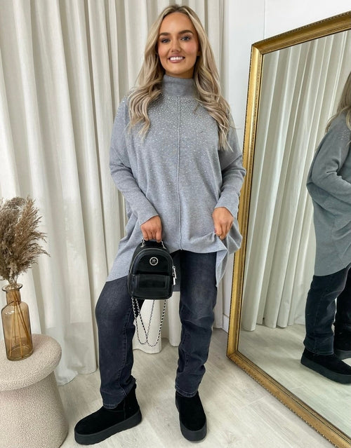 Light grey oversized knitted jumper with rhinestone dot pattern, high neck and long sleeves