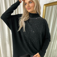 Black rhinestone-speckled knitted jumper with high ribbed collar and long sleeves
