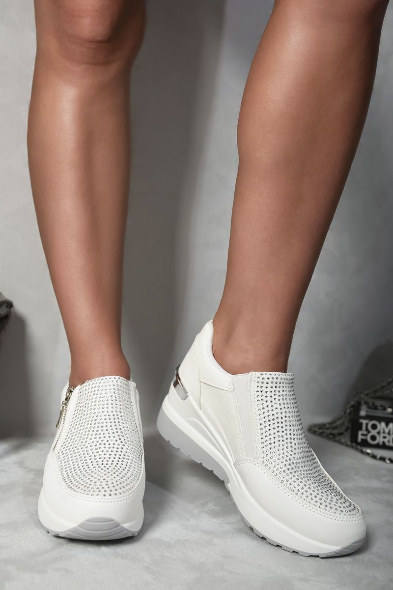 White platform trainers with perforated rhinestone-look uppers and side zip