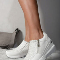 White platform trainers with rhinestone front and side zip, chunky sole