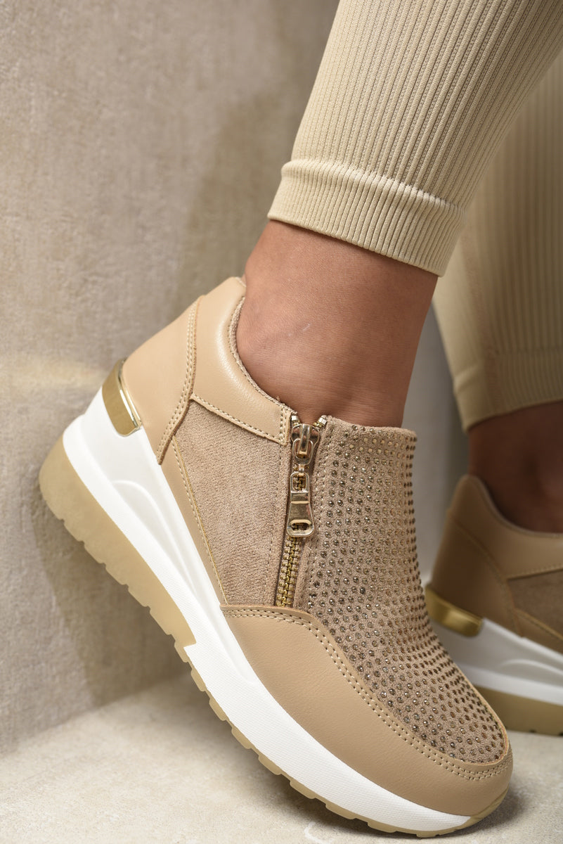 Beige platform sneaker with full side zip and rhinestone-textured front