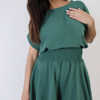 Green roll-sleeve top and elastic shirred waist shorts co-ord set, close-up