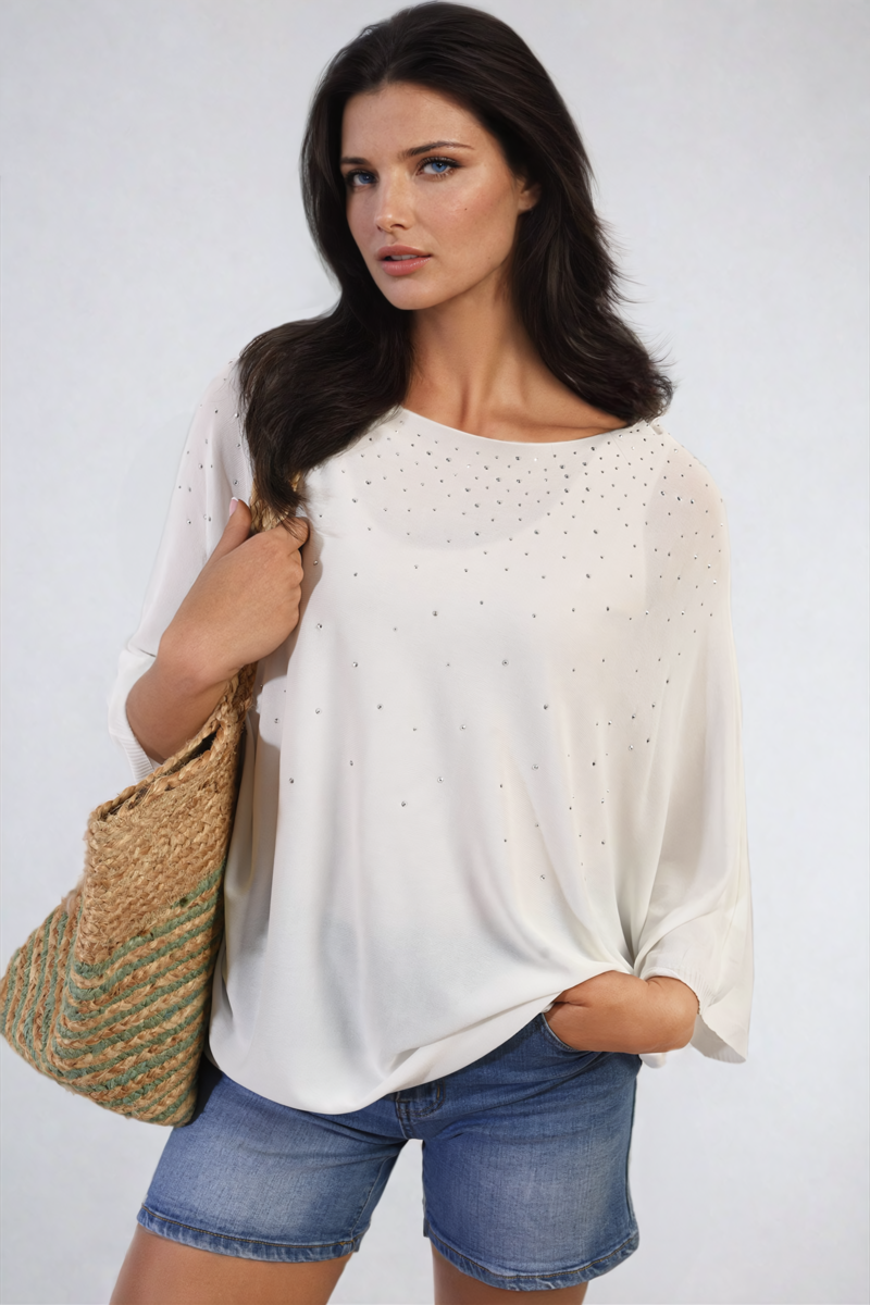 Oversized white round-neck top with studded speckle detail, draped batwing sleeves