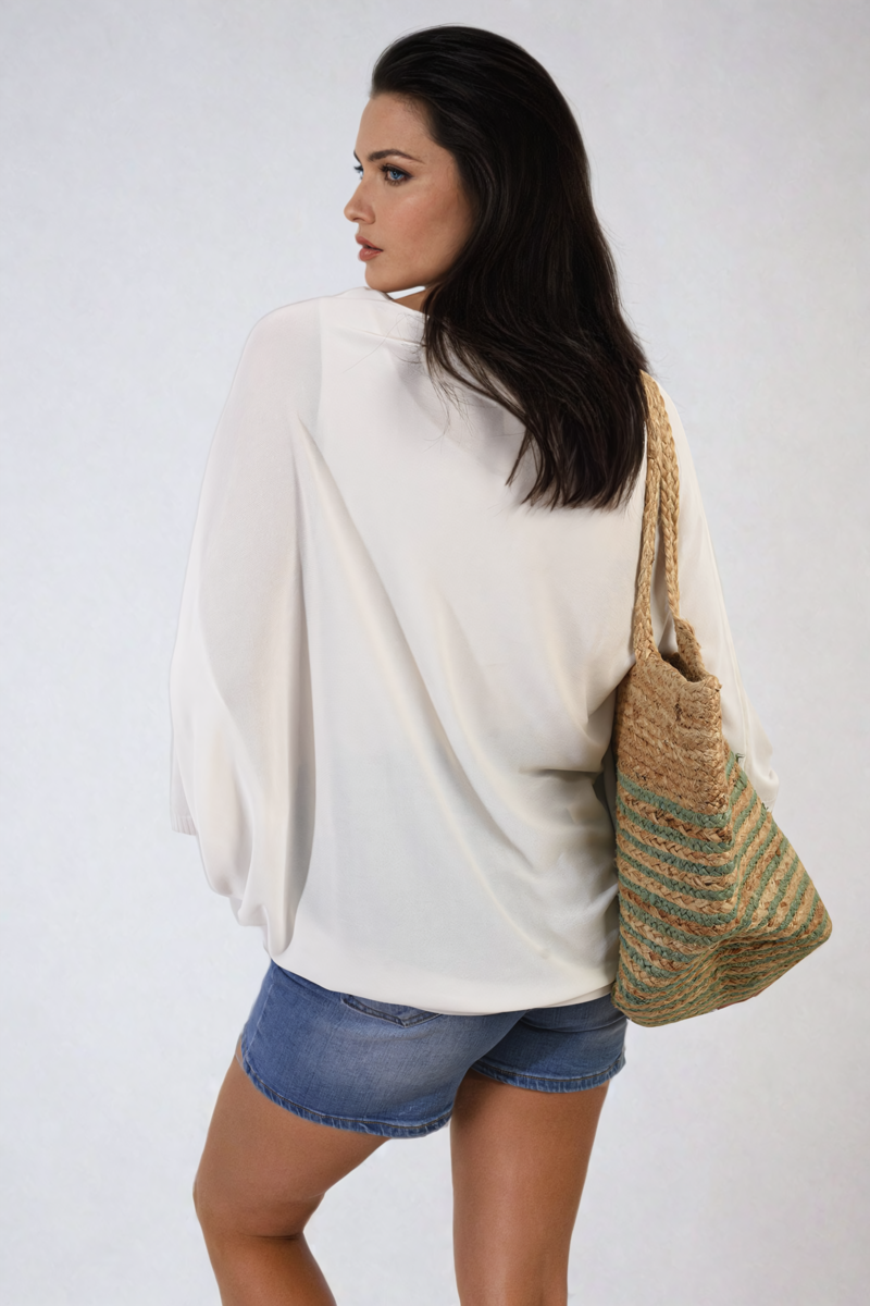 Oversized white round-neck top with draped batwing sleeves
