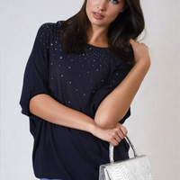 Oversized navy round-neck top with small studded dot accents