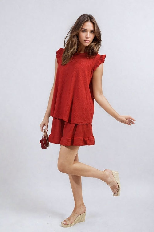 Red ruffle-trim sleeveless top and matching shorts set with layered tiers