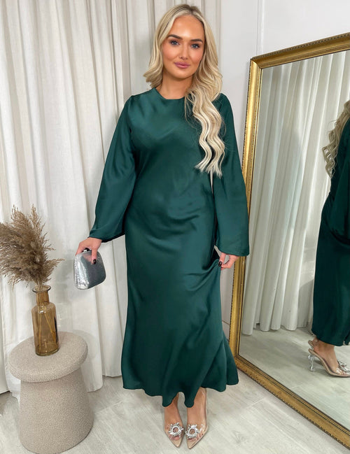 Green maxi dress with round neckline and bell sleeves, front view