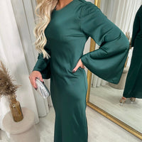 Green round-neck maxi dress with long flared sleeves, side pose