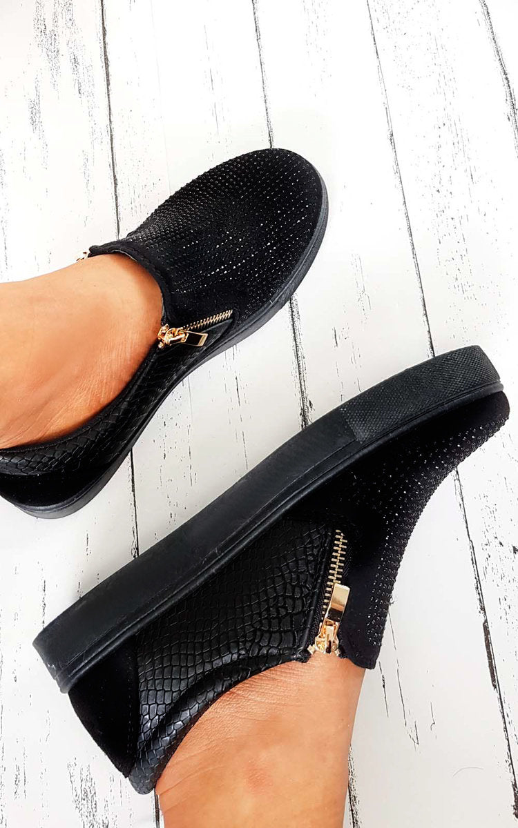 Black slip-on trainer with rhinestone-dotted upper, croc-effect side panel, gold zip detail.