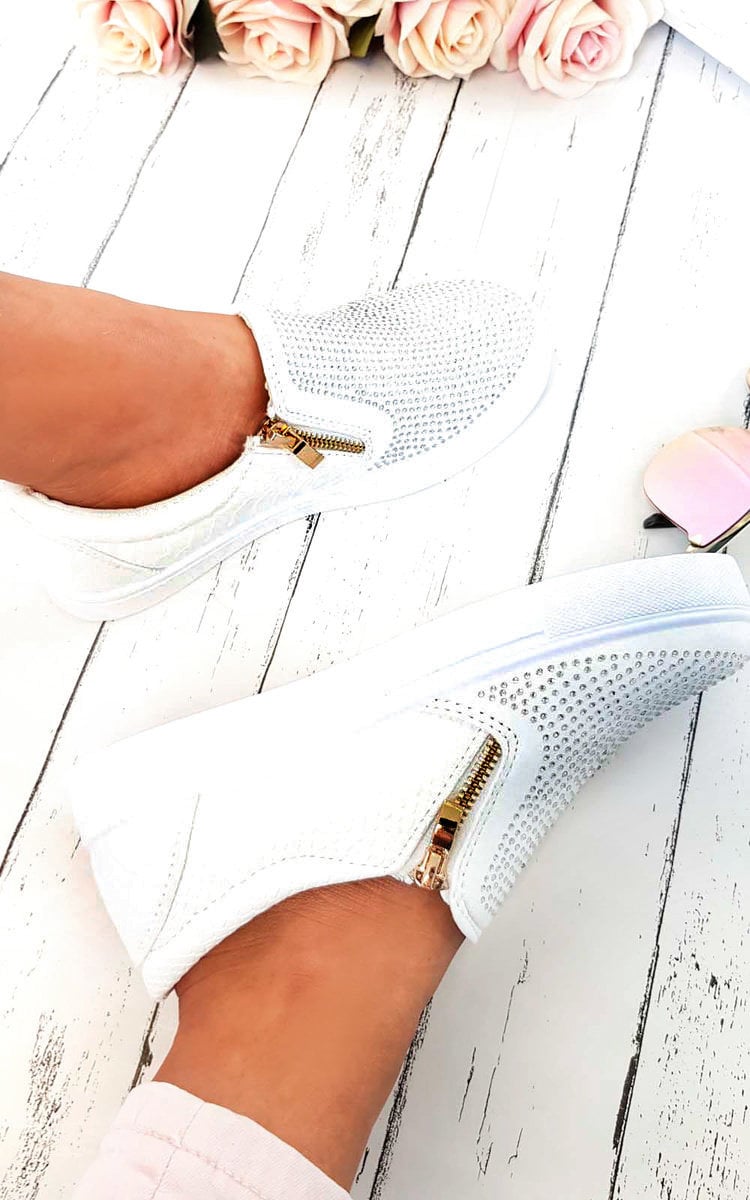 White slip-on trainer with diamante front and gold zip detail.