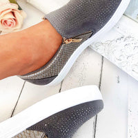 Grey slip-on trainers with rhinestone-dotted upper and croc-effect side panels, gold zip tab.