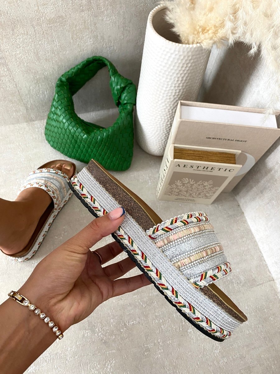 Platform slide sandals with light silver woven straps, textured braided trim, open toe