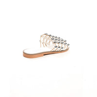 Studded lattice flat slide sandal, jeweled strap across toes and tan sole