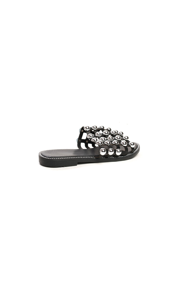 Dark flat slide sandals with silver studded strap and open toe
