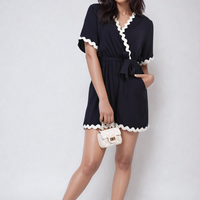 Dark wrap playsuit with scalloped contrast trim and waist tie, short sleeves