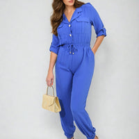 Blue collar button-front jumpsuit with drawstring waist, cuffed jogger legs, short sleeves