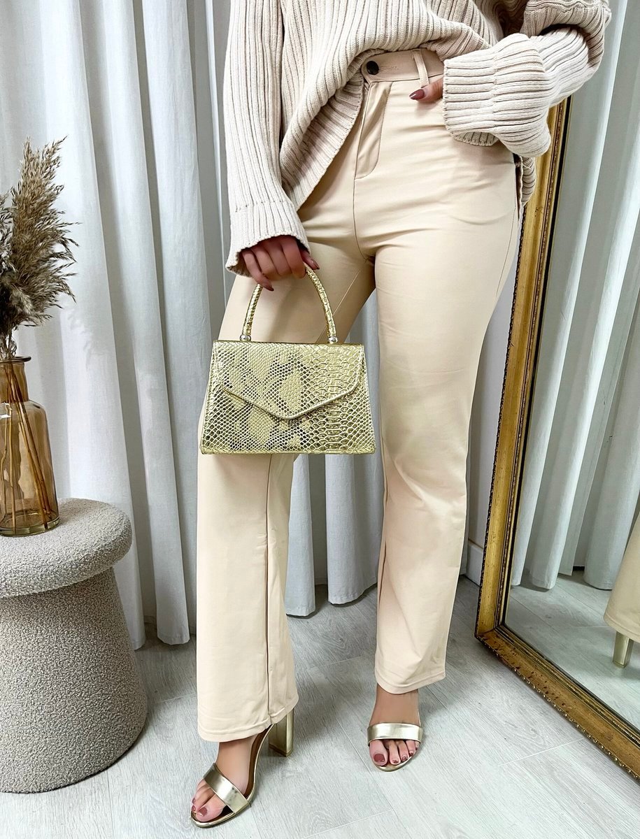 Beige faux leather high-waist straight-leg trousers with belt loops and front pockets