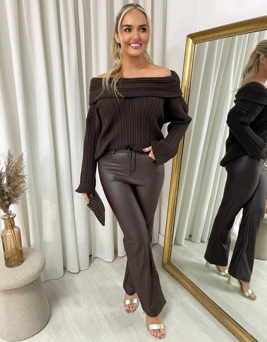 Dark brown faux leather high-waist trousers with straight legs, pockets and belt loops