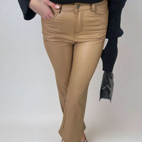 Faux leather trousers in camel beige with high waist and straight legs, front close-up
