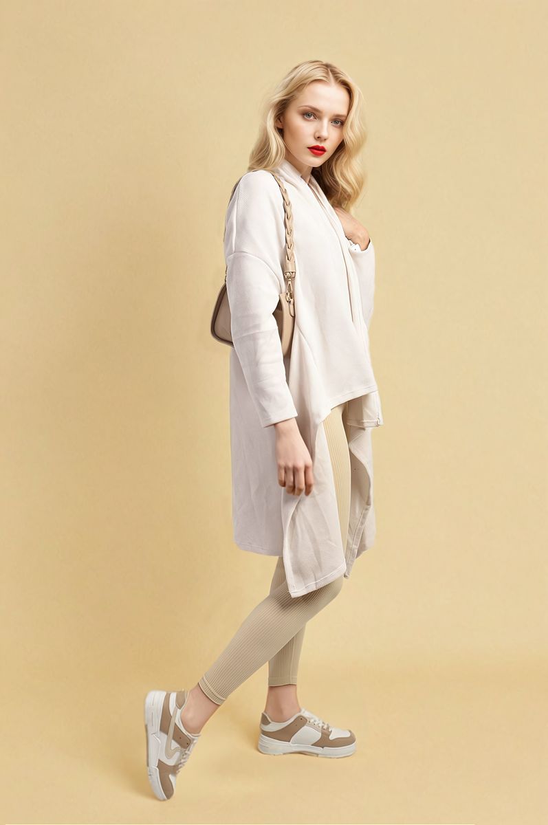 White open-front long knitted cardigan, draped front and sleeves, side-length hem.