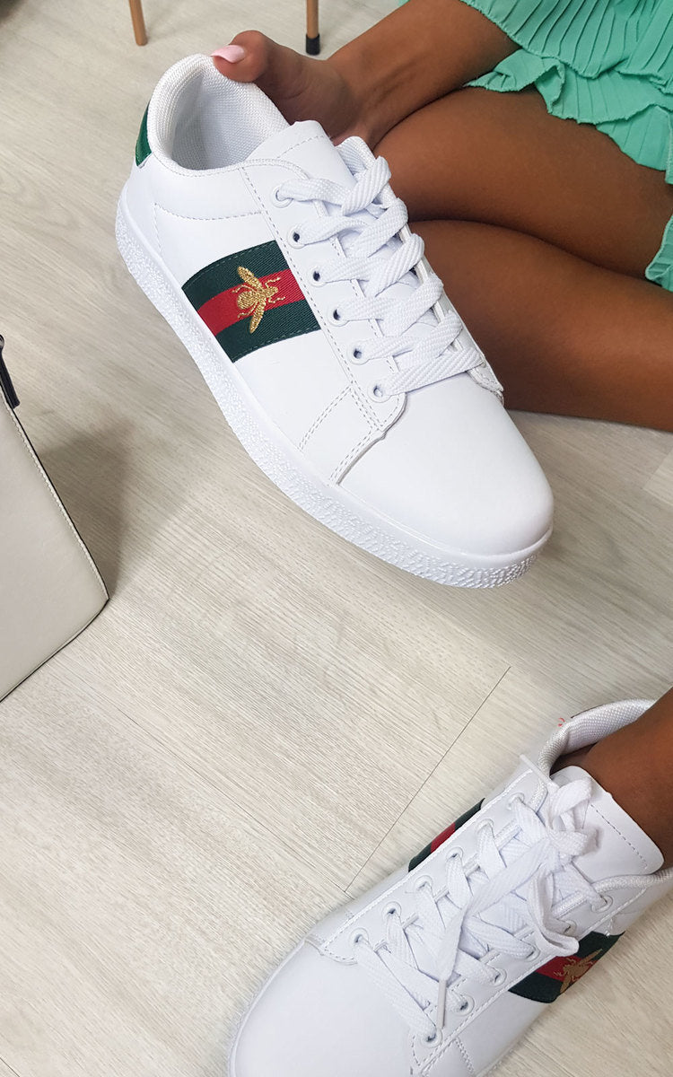 White trainers with colorful side panel, lace-up style and textured white sole