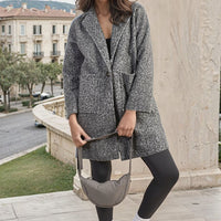 Grey textured button-front jacket with notch lapel and front patch pockets.