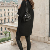 Textured button-front jacket with flap pockets, side view, black