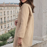 Textured button-front jacket with flap pockets, side view, camel beige