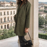 Olive textured button-up jacket with front flap pockets and wide sleeves