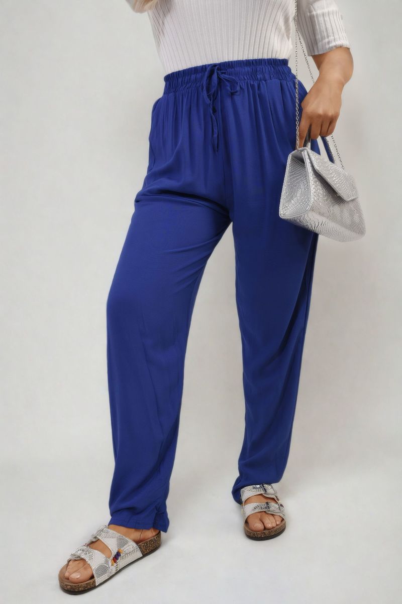 Royal blue high-waist drawstring pants with side pockets and tapered ankle shape