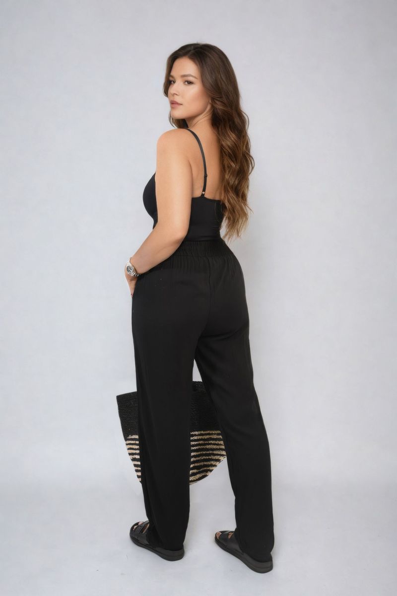 Black high-waist drawstring trousers with wide legs and side pockets.
