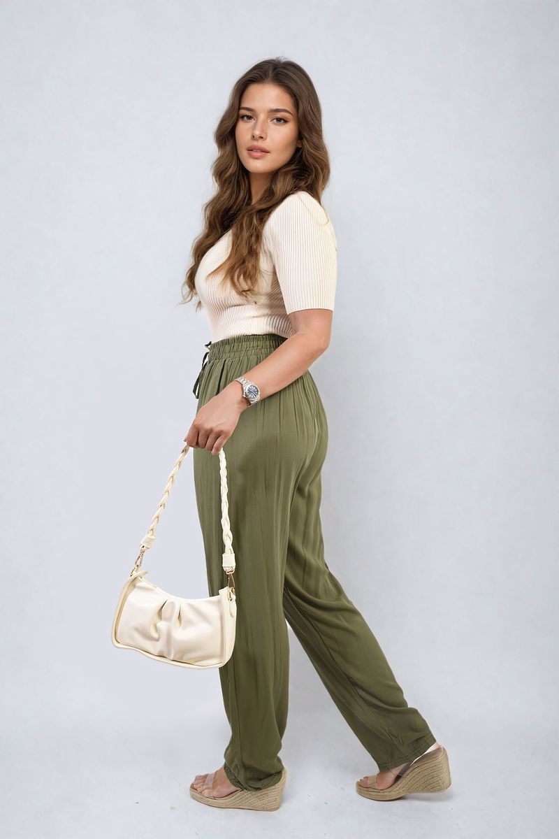 Olive green high-waist drawstring pants with side pockets and gathered ankle cuffs