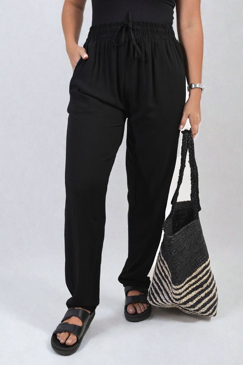Black high-waist drawstring trousers with side pockets and gathered elastic waistband.