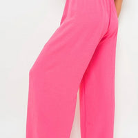 Pink fuchsia wide-leg trousers with drawstring gathered waist and airy, wide legs