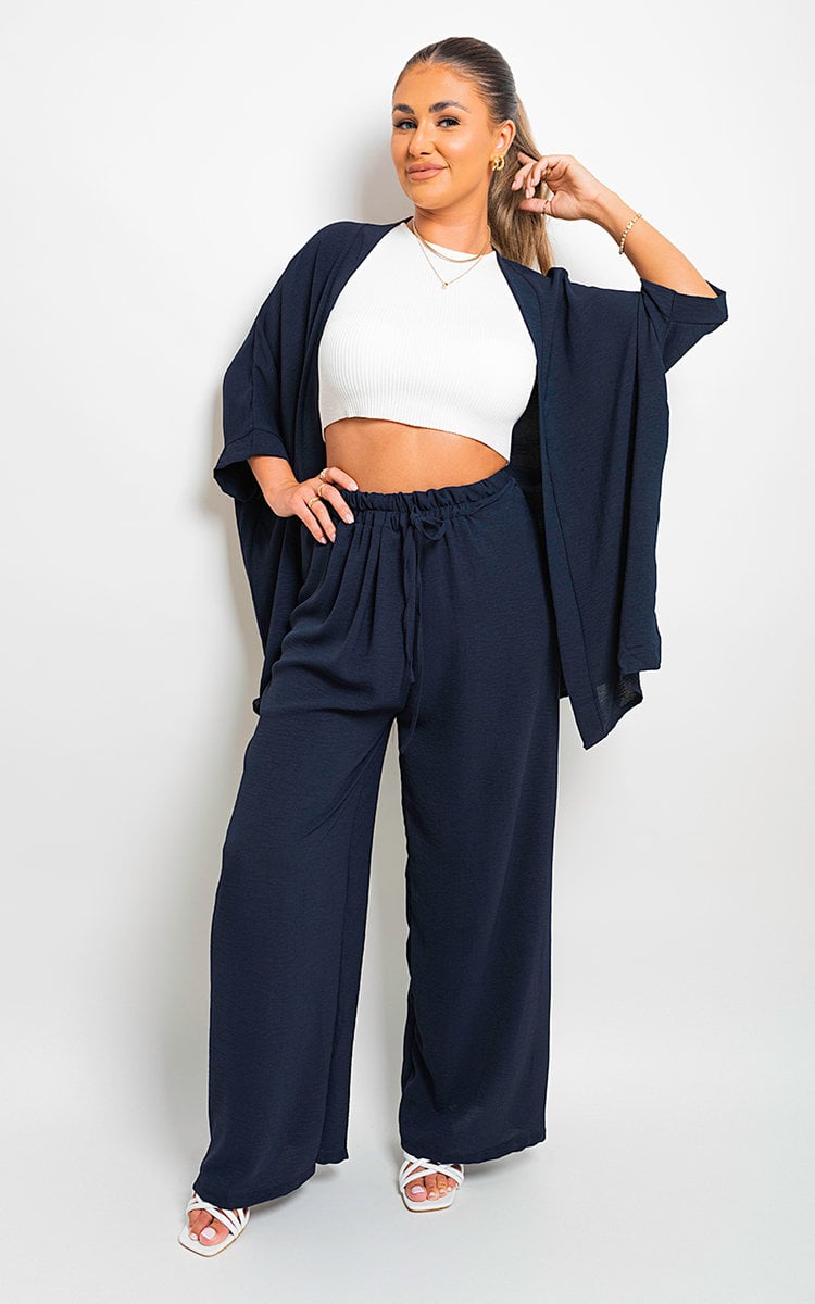 Navy wide-leg trousers with drawstring gathered waist and loose flowing legs