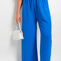 Royal blue wide-leg trousers with gathered drawstring waist, front view