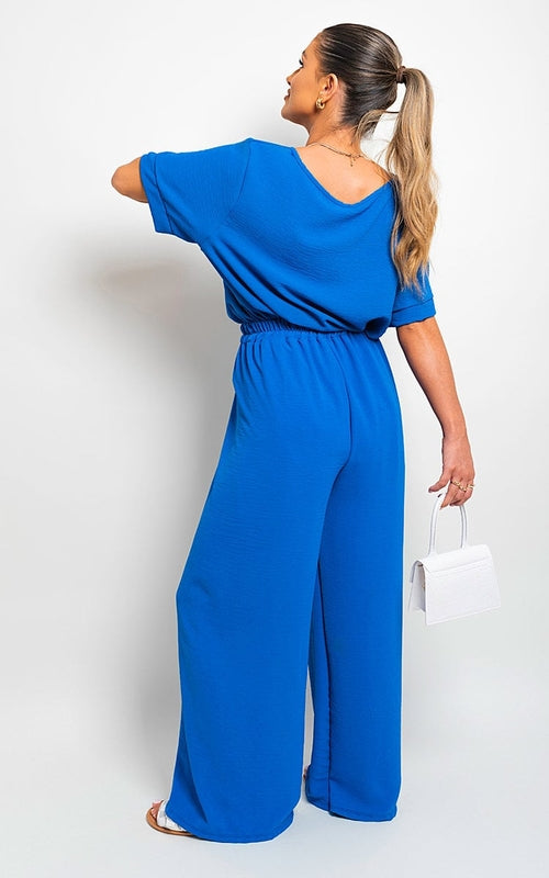 Royal blue wide-leg trousers with drawstring gathered waist and loose straight legs