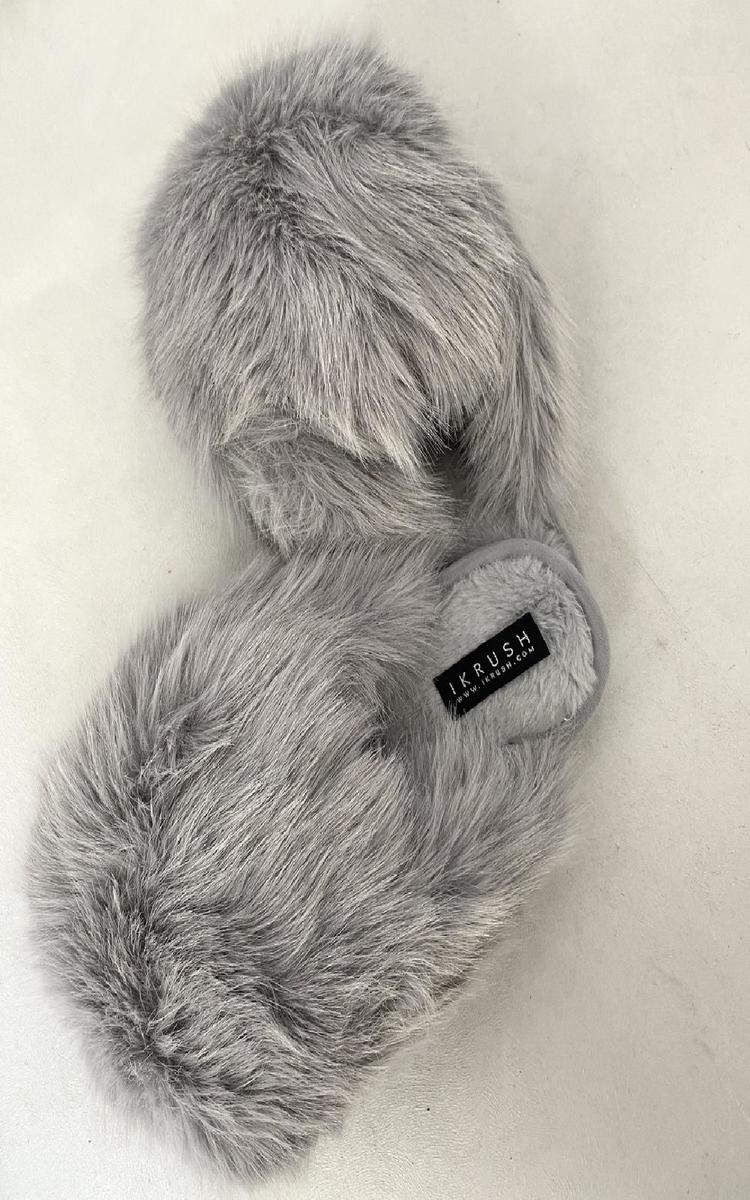 Grey faux fur open-back slippers, side view with small logo patch on cuff