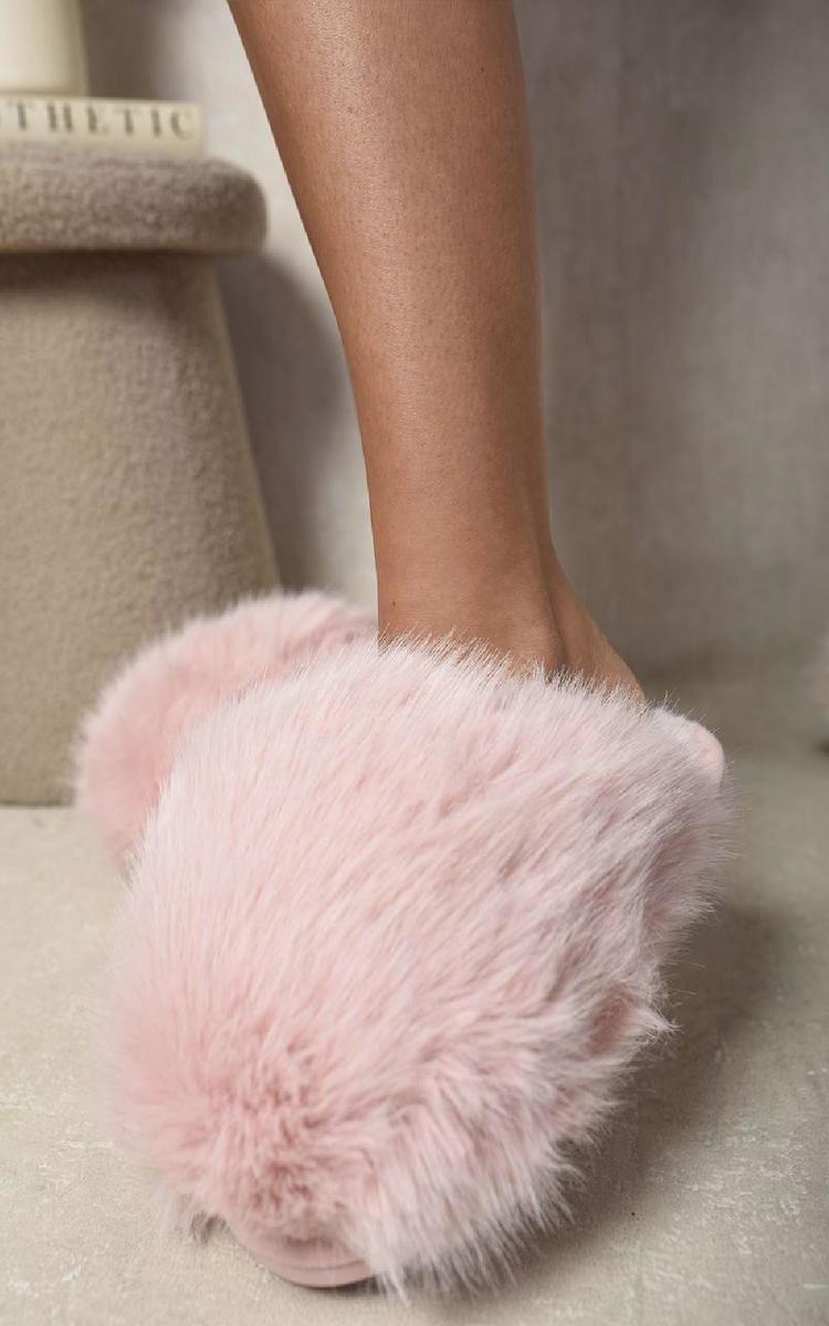 Pink faux fur slide slippers with open back and rounded toe