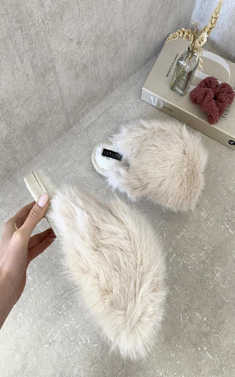 Cream faux fur open-back slippers with soft footbed and black logo label