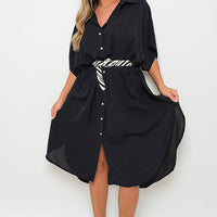 Black button-down collared midi dress with two front pockets and waist belt